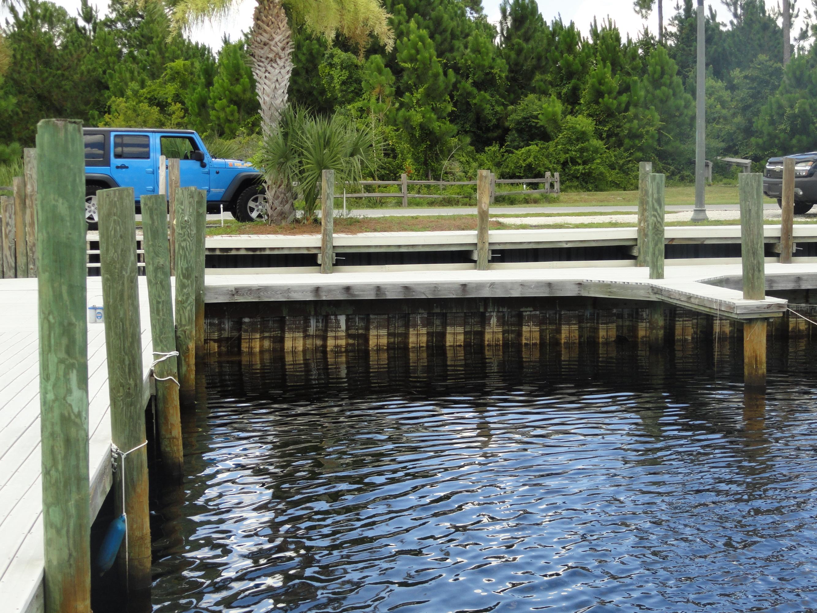What a rare opportunity to own a corner wet slip which allows labor saving time for loading and unloading and easy access to the Bay and Gulf Buyer should be familiar with the Harbourage Yacht Club documents prior to purchasing at www.hycmarina.com. If you have additional questions please call 850 867-3037. Buyer to verify all dimensions.