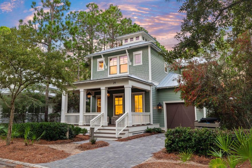 Perfectly positioned in the heart of WaterColor, this beautifully designed home offers space, style, and versatility--ideal for hosting, relaxing, or enjoying the beach lifestyle with family and friends. With four bedrooms, four-and-a-half baths, a dedicated bunk room, and a separate office that could easily be converted into an additional bedroom or bunk room, the layout provides flexibility for a variety of living arrangements. A charming paver walkway leads you to the welcoming front porch, where gas lanterns set the tone for the timeless coastal design found throughout. Inside, a soaring 25-foot foyer makes a striking first impression, flanked by a private study behind French doors and a staircase leading to the upper level. The open-concept living and dining space showcases high ceilings, hardwood floors, shiplap accents, and walls of windows that frame serene views of the lush natural landscapeoffering both privacy and beauty.

The gourmet kitchen is a showstopper, outfitted with Thermador appliances, white custom cabinetry, quartz countertops, and a coastal tile backsplash that flows into a convenient built-in desk nook. A spacious center island is ideal for entertaining, while the formal dining area is anchored by a bold statement light fixture. Just off the main living space, a large screened porch invites relaxed evenings and effortless indoor-outdoor living.

The first-floor primary suite offers a peaceful retreat with shiplap detailing, a coffered ceiling, and a spa-inspired ensuite featuring dual vanities, a soaking tub, and a walk-in shower. Upstairs, a cozy loft provides a second living area perfect for movie nights or quiet reading, while each guest bedroom has its own private bath for added comfort and privacy.

Additional highlights include a single-car garage ideal for storing a golf cart or beach gear, plus off-street parking for 2-3 vehicleswith the potential to extend the pavers to meet additional parking requirements if desired.

Enjoy all that WaterColor has to offer with easy access to the community's many amenities: multiple pools, the WaterColor Beach Club, Camp WaterColor's lazy river, tennis courts, nature trails, and nearby shops and restaurants. With the Gulf of Mexico just minutes away, this home is your gateway to the ultimate 30A lifestyle.