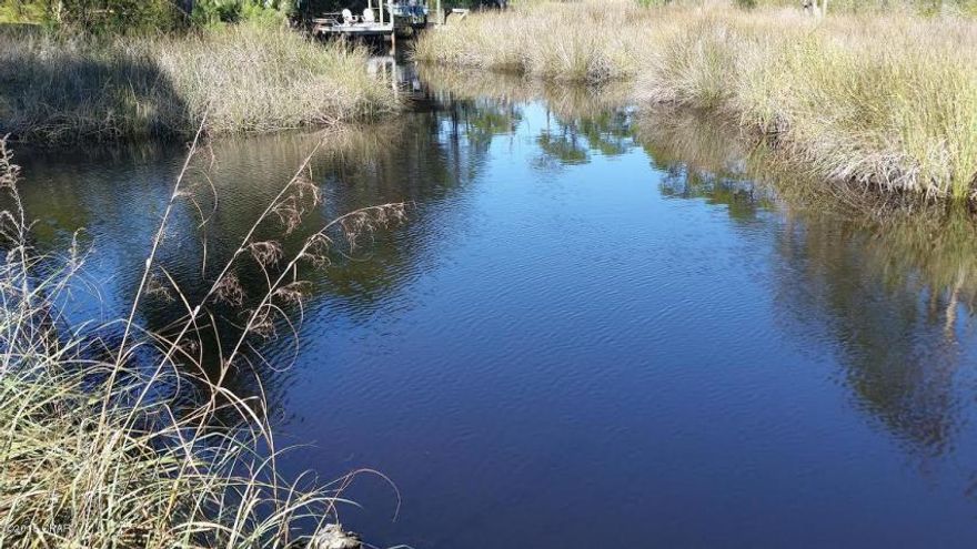 Rare estate size water front lot on Lake Powell canal front. Great access for a 17' to 19' boat, kayaks and paddle boards. LOCATION LOCATION LOCATION with a short walk to Rosemary,Seacrest, Alys Beach and the great gulf front public park at Inlet Beach. Very large building lot that is high and dry, and ready for hat beautiful new beach house for private or rental.Home next door just purchased and getting ready to be completely remodeled.