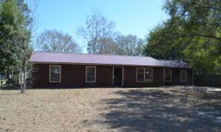 This spacious four bedroom home has a ton of potential. Needs repair but a great opportunity for investor's looking for rental income or first time buyers. Call to see this home today!