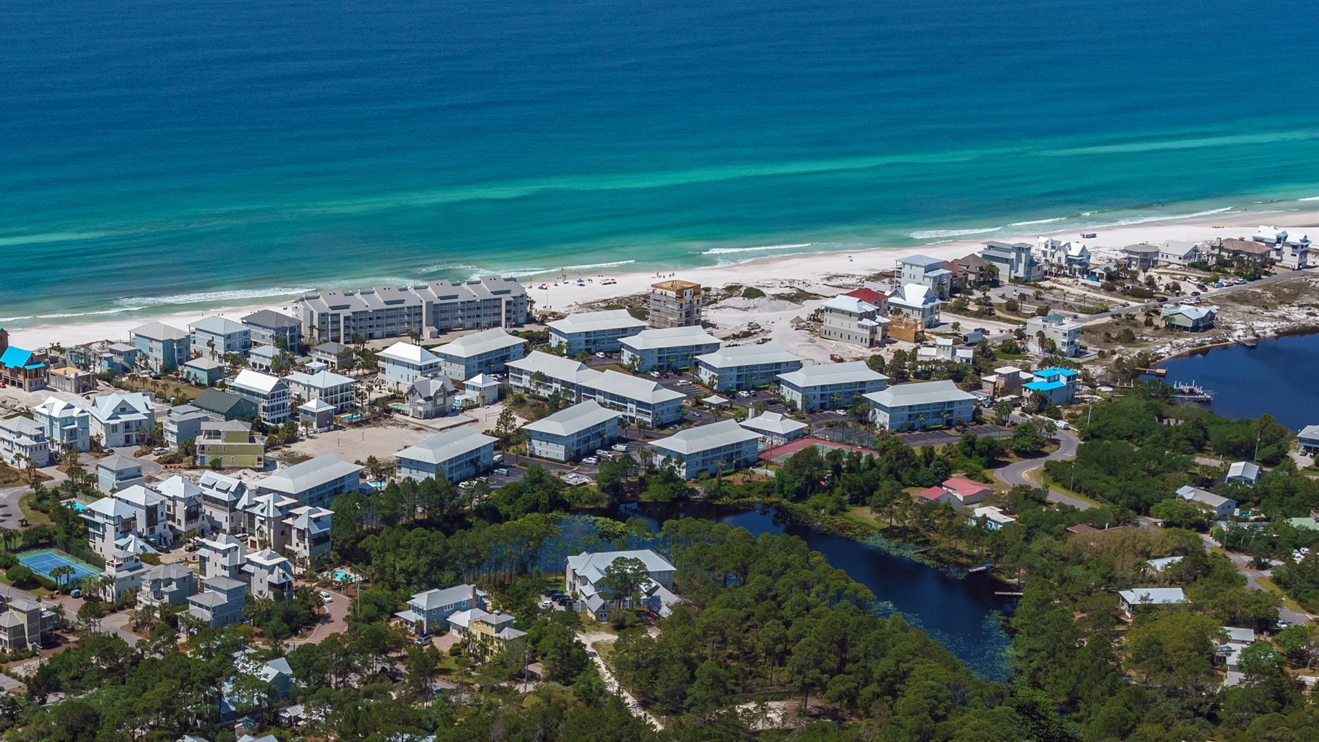 Under Contract, accepting back up offers. Almost $30K booked for 2022! This wonderful updated 3 bedroom and 2 bath condo is just steps to the Gulf of Mexico and the perfect spot after a full day at the beach. This second floor unit with peak a boo view of the water comes fully furnished and rental ready. The condo has been updated with new wood floors in living and kitchen, granite countertops  and all new stainless steel appliances. The large balcony can be accessed from the living room and primary bedroom, perfect for those who enjoy indoor/outdoor living. The condos at Beachside Villas are tucked away south 30A in Seagrove and just steps to the beach down private walkway from unit. The complex features 2 pools (one heated seasonally), tennis courts, shuffleboard and bbq/grill area