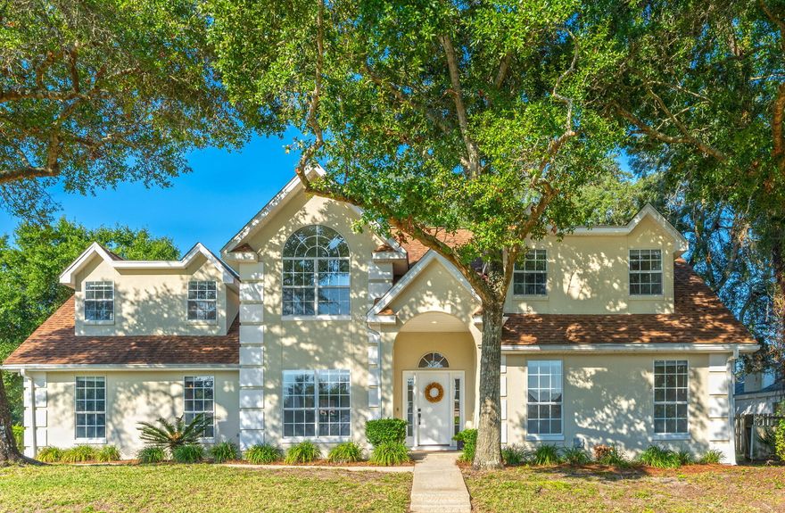 Perfectly positioned on a high corner lot, this 2,663 square foot, 4 bedroom + office/bonus space, 3 bath brick home offers coastal charm, modern updates, and gorgeous glimpses of Choctawhatchee Bay. From the moment you arrive, the elevated setting and bay breezes set the stage for a lifestyle filled with comfort, connection, and relaxation.Step inside through the welcoming foyer with soaring ceilings, leading into a spacious living room flooded with natural light. Here, high vaulted ceilings, recessed lighting, a wet bar, and a cozy fireplace create the perfect backdrop for entertaining or quiet evenings at home.The large kitchen has been beautifully refreshed with painted cabinets, new light fixtures, and ample cabinet space. A breakfast bar, bright breakfast nook, built-in desk, and a separate dining area make this space both functional and invitingideal for everyday living and hosting family gatherings.

The first-floor primary suite is a retreat of its own, featuring a spacious ensuite with a garden whirlpool tub, dual sinks, his-and-hers closets, a private water closet, and a walk-in shower. Upstairs, three additional bedrooms all enjoy water views and share a well-appointed bathroom with a double vanity and brand-new faucets.

Throughout the home, you'll find new luxury vinyl plank flooring in the main living areas, plush new carpet in the bedrooms, and fresh paint throughout, making this home completely move-in ready. The two-car garage opens into a laundry and mudroom with an additional space perfect for storage, a hobby room, or even a small office.

Outdoors, you're just steps from the water, where you can soak in stunning sunsets and refreshing breezes. Take a golf cart or bike ride to Meigs Beach for fishing, boating, and beachside fun. For recreation, Shalimar Country Club and Shalimar Pointe Golf Club are just minutes away, offering tennis, golf, and a welcoming social atmosphere.

Beyond the neighborhood, Shalimar offers a small-town coastal feel with bayfront parks, fishing piers, and easy access to the Gulf of Mexicoall while being just 10 miles to Eglin Air Force Base and 11 miles to Hurlburt Field.

Recent updates & highlights:
	"	New luxury vinyl plank & carpet throughout
	"	Fresh interior paint, including painted kitchen cabinets
	"	New light fixtures in dining & kitchen nook
	"	New faucets in upstairs bath
	"	New Hot water heater 
	"	Two Newer HVAC units
	"	All copper wiring

This beautiful Shalimar home offers the best of coastal Florida livinga balance of everyday comfort, a warm and inviting atmosphere, and a backdrop of bay views perfect for entertaining or unwinding.
