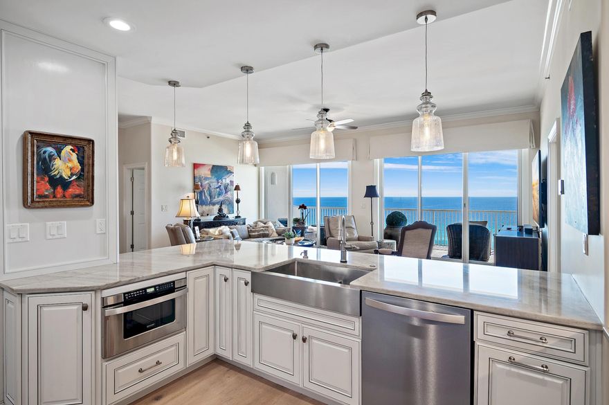 Welcome to Empress, where luxury living meets breathtaking Gulf sunset views. This spacious 10th-floor condo boasts 10-foot ceilings and separate climate-controlled storage. With a complete upgrade, including the removal of the center wall to create an open floor plan and enjoy unobstructed views of the gulf, bay, and resort lake.The expanded kitchen features high-end finishes, a gas range and double ovens, perfect for culinary and entertaining enthusiasts. A stunning wet bar and gas/ventless fireplace adds warmth and ambiance to the living space. Upgraded hardwood flooring and ceiling lines enhance the modern aesthetic throughout.Retreat to the elegantly redesigned bathrooms and spacious walk-in closets for ultimate comfort and convenience. For further details, click More.... Enjoy peace of mind knowing that your home is equipped with an updated HVAC system and dual hot water heaters, including a tankless unit (new since 2018). 
This condo comes with one assigned covered garage parking spot for added convenience. Amenities include a pool, hot tub, and fitness center overlooking the serene lake.
Experience coastal living at its finest at Empress. Schedule your private tour today and embrace the luxury lifestyle awaiting you.
