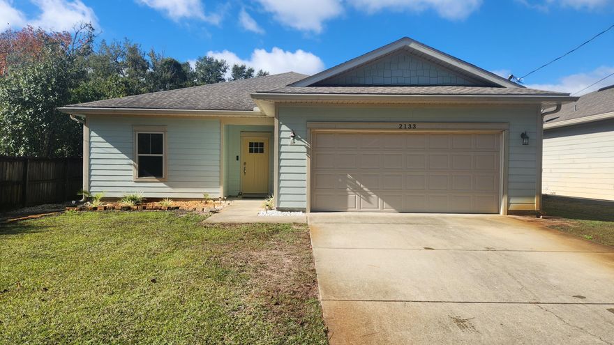 Charming 3BR/2BA Navarre home minutes from schools, shopping, and Navarre Beach. Enjoy a bright open living area with vaulted ceilings, a spacious kitchen with breakfast bar, and a dining area overlooking the backyard. The primary suite features a walk-in closet and private bath, with two additional bedrooms for guests or an office. Large fenced yard, patio, and attached garage. Washer and dryer included as-is. No pets and no smoking permitted. All leases through Property Management on the Panhandle include the $50/mo Resident Benefits Package with insurance, credit building, filter delivery & more.