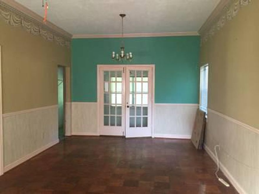 Home has good structure, needs outside TLC. great starter home with high living ceilings. Bedrooms are good size. It's a really neat home.