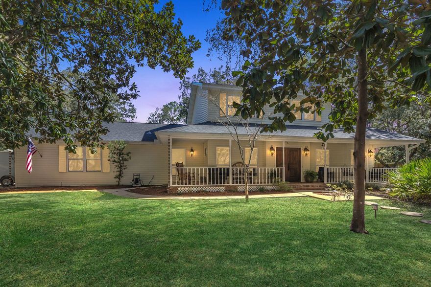 Welcome to 821 Weeden Island Drive, a beautiful corner-lot home just a short walk from water access and boat launch. This 3-bedroom, 3 bathroom home offers spacious living areas, and a wraparound porch perfect for enjoying the coastal breeze.  Key Features: Large Corner Lot - Offering extra space, privacy, and curb appeal. Updated Electrical - Recently upgraded for efficiency and peace of mind.New Garage Flooring - adding durability and style. Large Amazing Yard is beautifully landscaped with mature trees offering shade, privacy and plenty of space to enjoy. Proximity to Water Access - Walk to Pin Oak water access and boat launch for easy boating, paddleboarding, or fishing.