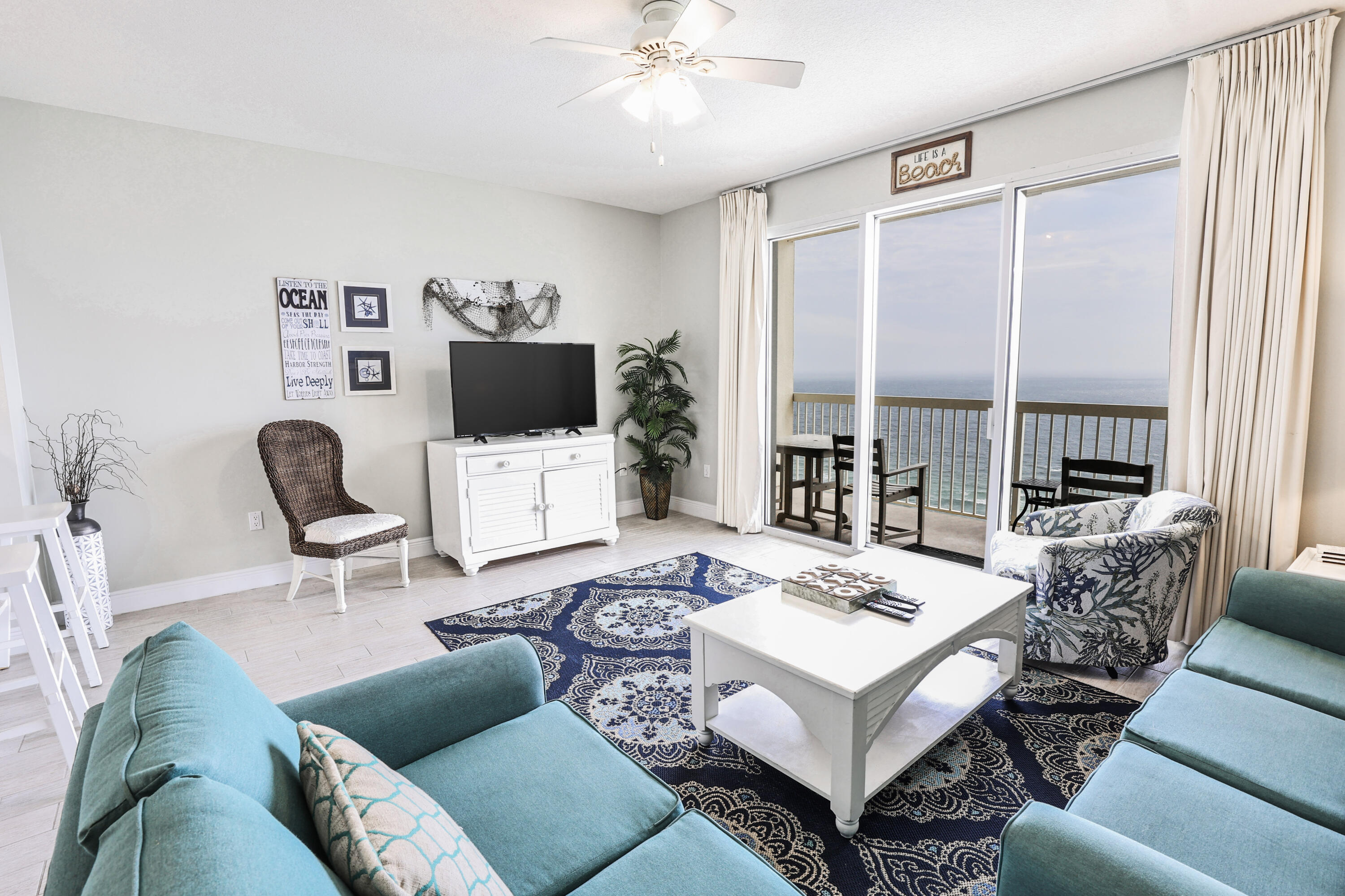 Start or add to your rental portfolio with this condo on the must-desired west end of Panama City Beach that offers gulf-front views and close proximity to the best shopping, dining, recreation and entertainment that this coastal community offers. This one-bed plus bunks and two-bath unit boasts a king-sized owner's suite with private bath. A gulf-front living room with private balcony capitalizes on unobstructed views of the beach. Both the kitchen and living room have recently been redecorated. But, the pinnacle of a gulf-front location is the outdoor amenities; here, that includes two pools (one indoor/outdoor heated seasonally and one gulf-front) as well as two hot tubs and beach service for guests at no cost for a majority of the year. Celadon Beach is the last condo complex on Front