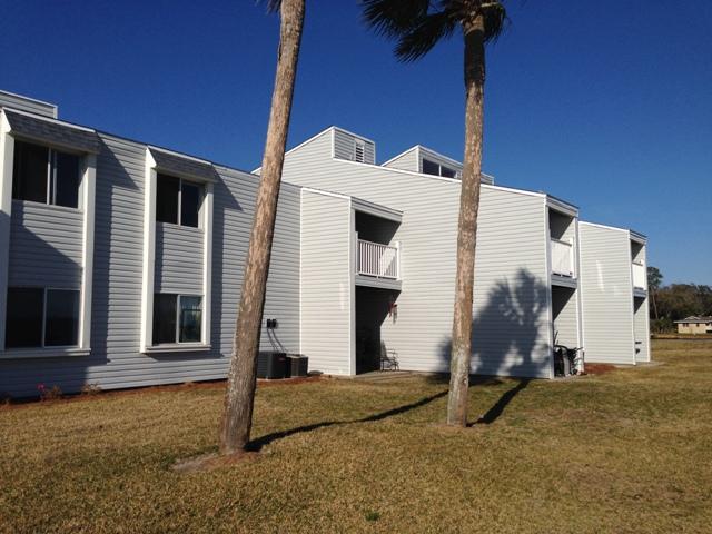 REO ~ Finisterra Bay Front! This 2 Bd / 2 Ba offers incredible views of the bay. The living room & dining room both feature tile floors. Relax on the balcony & enjoy views of the sunset. Finesterra offers maintenance free living with community pool & tennis. This property is eligible under the Freddie Mac First Look Initiative through April 1, 2016.