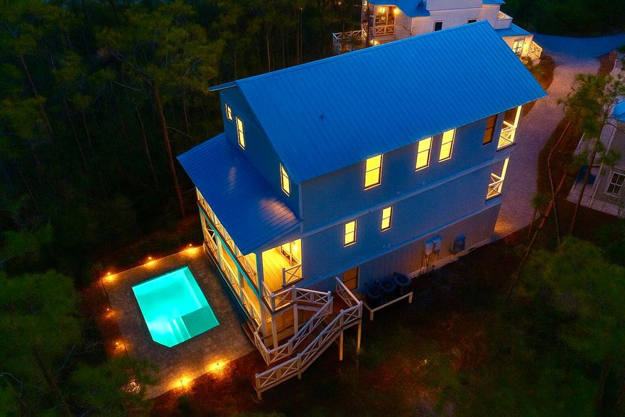 Brand new - 5 bedroom, 5.5 bath house in gated Treetops neighborhood adjacent to Seacrest with excellent rental projections ($150,000+) and deeded beach access just half a mile away. (Free golf cart beach shuttle picks up 50 yards from house) Enjoy a coastal chic, open concept design perfect for entertaining. The main floor (second floor) includes the living room, dining room, kitchen and laundry room. The first floor includes a two-car garage, entry way and two guest suites with private bathrooms. The third floor includes the spacious master suite with a luxurious master bathroom and a huge closet. The third floor also hosts two additional guest suites with private bathrooms. Treetops offers direct access to both 30A and Hwy 98 with easy access to Rosemary, Seacrest and Alys Beach.