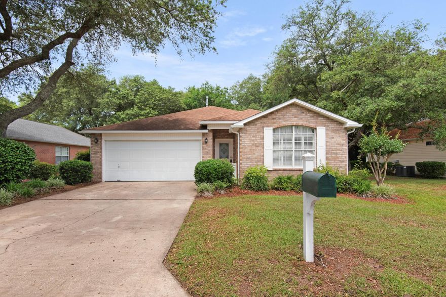 Time to snag your piece of paradise in the coveted gated community of Magnolia Plantation! Welcome to 1412 Pearl S Buck, this cozy property is nestled on a gorgeous fenced lot with mature landscaping, open patio, and tucked away on quiet street & ready for your personal touch! Lovingly maintained, the major items have been updated (roof 2016, Hvac 2017, WH 2025) and the rest is ready for you to create your own custom finishes and updates. Inside you'll find 3 bedrooms and 2 full baths and a sprawling open floor plan including a neutral kitchen, large dining area, and family room with corner fireplace and soaring ceilings. The bonus Florida room space can be an office, additional living space, or play room - perfect flexibility to make it your own! Natural gas is located for the outdoor grill, fireplace, water heater, and HVAC. The fully fenced backyard includes a well for irrigation and plenty of space to enjoy a private backyard. The garage features a new overhead opener plus custom cabinets and work bench. Come see this gem today! 