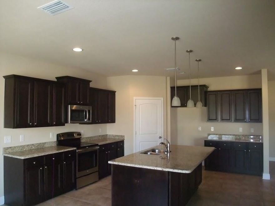 The Victoria is a 4 bedroom, 2 1/2 bath open concept with split bedroom plan. Master suite with garden tub, separate shower, double vanity and a huge walk in closet. Kitchen with large kitchen island, pantry and very large dining area. Additional bedrooms with 2nd full bath also with double vanity sinks. Separate laundry room, 1/2 bath for guests and a 19 foot covered patio. Photos are of a similar, and not necessarily of subject property. Listing Broker/Salesperson has ownership interest in the property.