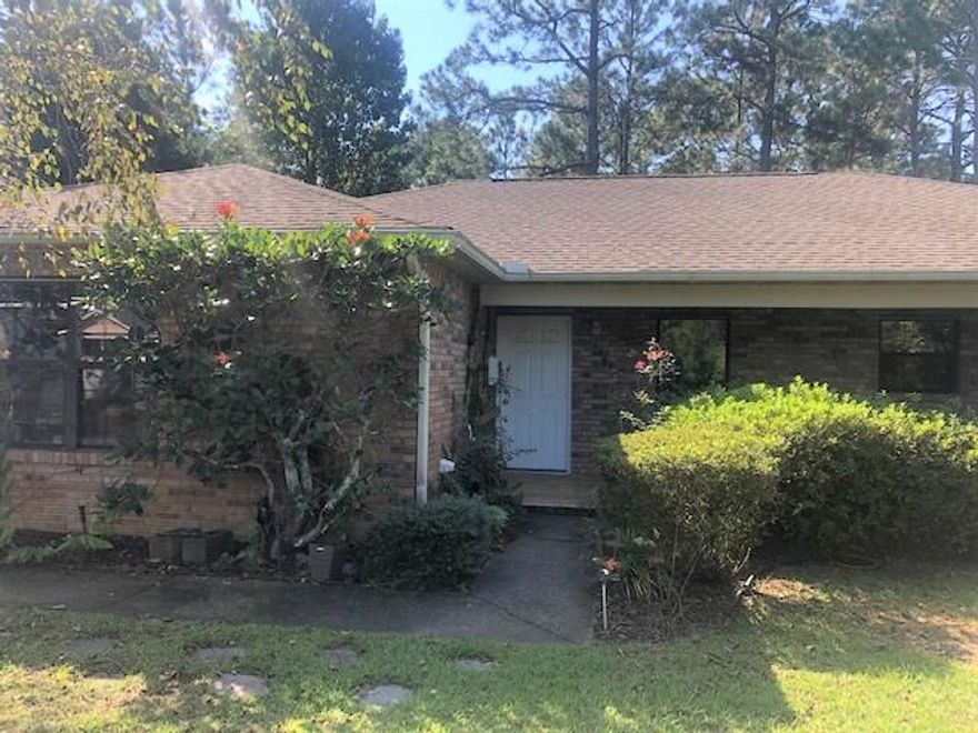 Great Home! Located in beautiful Holley by the Sea. Split floorplan! Master separate from additional rooms This is a 3 bedroom and 2 bath with a Side Entry 2 CAR GARAGE on a LARGE Lot. All APPLIANCES and Washer/Dryer Included. Living Room is  Spacious and features a corner FIREPLACE from there step through the French Doors to the Florida Room. Spacious Master Bedroom has an ensuite bathroom and French Doors leading out to the Florida Room. Features Gutters throughout and a Newer A/C  installed in 2019, Water Heater installed 2019, Roof installed 2006,  and 16X16 SHED 2012.