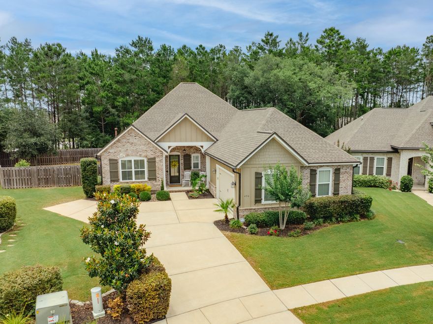 Home Under Contract with Kick Out Clause. Back up Offers accepted. Best Value in this exclusive Randy Wise neighborhood located in the highly sought after Meadows area of Hammock Bay.   Constructed in 2018, this immaculately maintained, move-in ready gem is priced to sell.  Over 50k in spectacular upgrades including a custom fireplace, Luxury Vinyl plank flooring, a privacy fence and custom window treatments make this home really sparkle.   Gas cooktop and vented range, farm-style stainless steel sink and side by side commercial-sized Frigidaire refrigerator freezer along with ample counter space make this kitchen a dream to cook in whether for family night or entertaining guests.