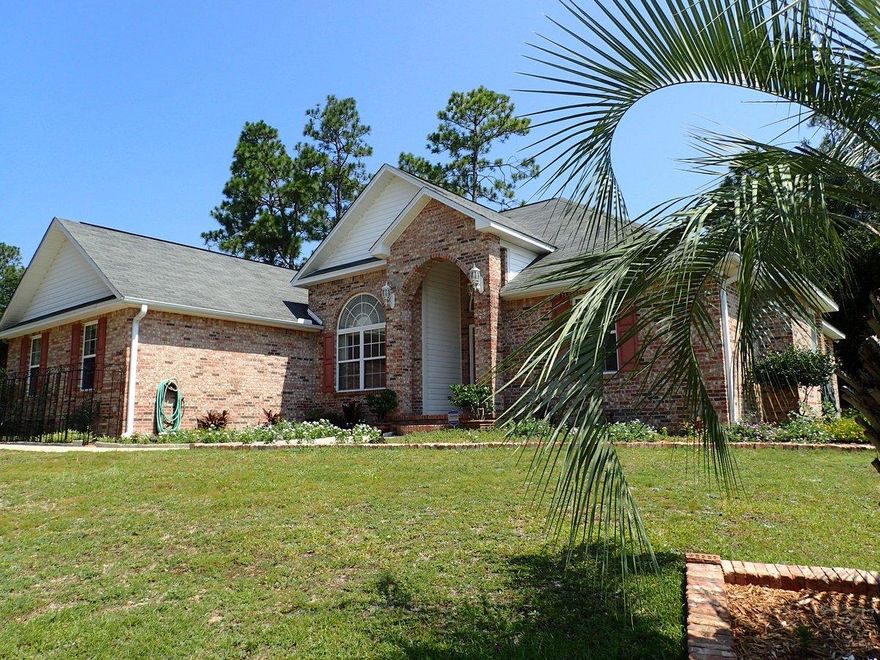 Look no more! This 2004 home is ready for new owners! Resting on just over 1 acre, this corner lot all brick home has 220 wiring for RV parking, recently built gazebo and side entry garage. Split bedroom design, this 3 bedroom 2 and a half bath home has large great room with fireplace, separate dining area and breakfast area as well. Large kitchen has plenty of storage and all appliances. Throughout, there is wall to wall carpet, tile in wet areas and indoor laundry. Vaulted ceilings in the great room and coffered ceilings in master. Master bedroom is oversized and master bath has double vanity, separate shower and garden tub. Priced to sell so call today before its gone!