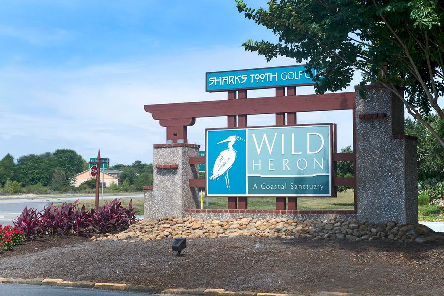 Discover Wild Heron's  luxury living in a recreational community. This is a breathtaking lakefront gated community.This unique lot sits on the 10 th hole on this  award winning course, SHARK'S TOOTH is designed by GREG NORMAN. Wild Heron is an upscale development with custom built homes in a Craftsman style design.This property sits at the end of Lost Cove Lane and has preserve land on the north side and across the property sight line onto the 10 th green. The lot allows you to build  your dream house with privacy and top notch luxurious amenities.Prospect Point Club house includes lake front amenities boat dock, canoes, kayaks. The 25,000 sq ft Club house invites you to enjoy the heated pool, hot tub, fitness center, bar, grill playground, campfire ring ,tennis courts.