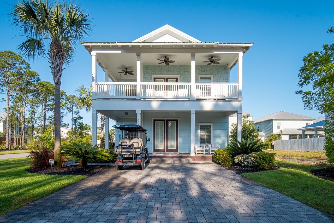 Nestled behind the private gates of Frangista Beach,  this Florida Cottage is a short golf cart distance to the deeded beach access with rental projections over $90,000. As you enter the home, the open floor plan showcases the expansive living room, dining area, custom cabinetry and granite countertops. This home features a master bedroom on the first and second floor with balcony views to enjoy the sunset.  This subdivision is close to all amenities of life and shopping while enjoying your favorite restaurants on the beach.
