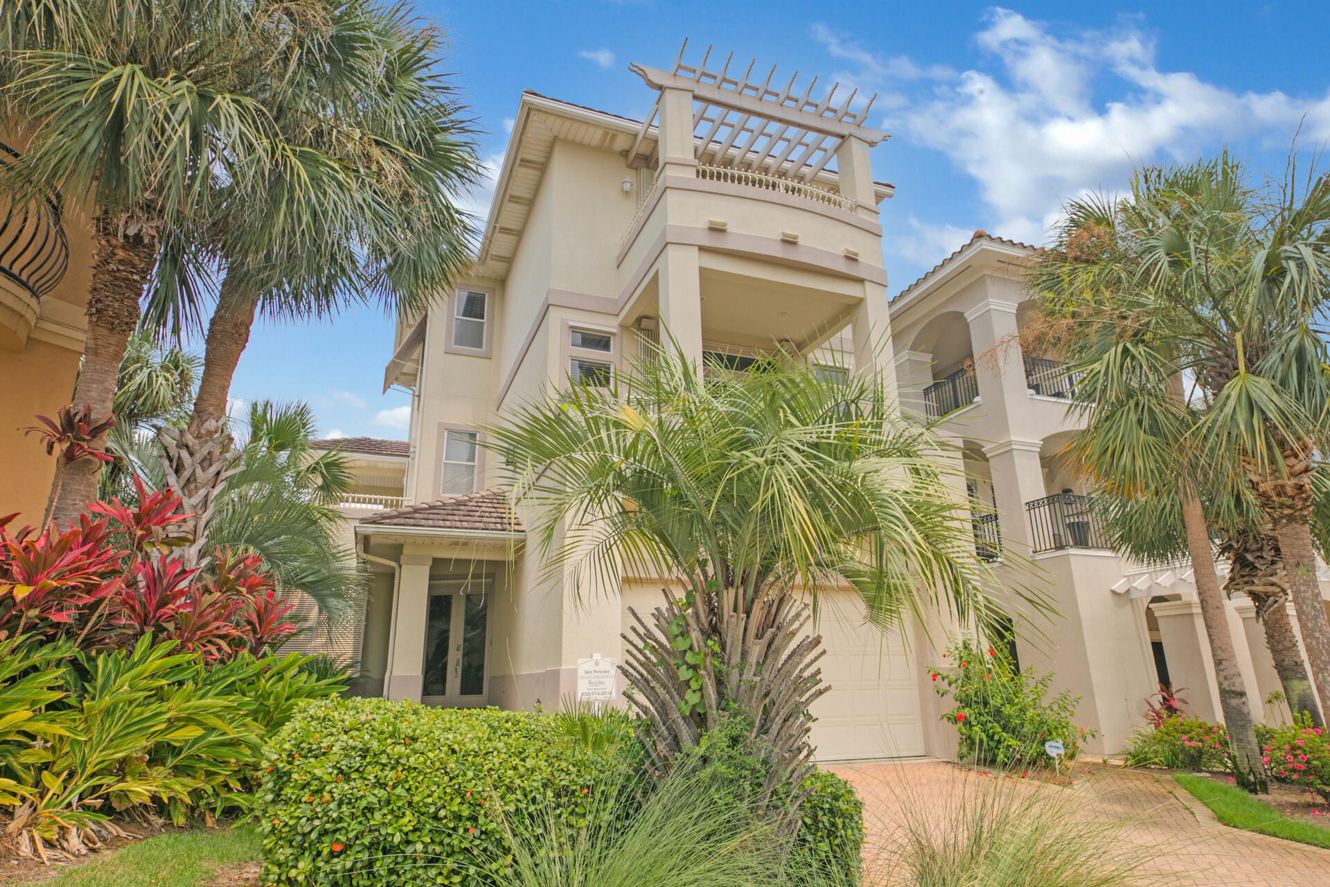 This spacious and stunning Destin Beach home features both modern amenities and architectural character in a fantastic Gulf Front and Gated Beach luxurious community. Enjoy stunning and tranquil gulf views and lake views from multiple oversized private balconies. Located less than 75 yards to both the community pool and the largest private beach in all of Destin. From one of the deluxe balconies you can entertain and plan a party around the built in grill/kitchen areas and wet bar with mini fridge overlooking the lake. This home showcases two Master bedrooms (1st and 3rd floor). Your friends, family and vacationing guests will love the 2nd floor highlights - An open living area w/ fireplace and a chef's sized kitchen w/ beautiful cabinetry and endless granite counters. Do not miss this!
