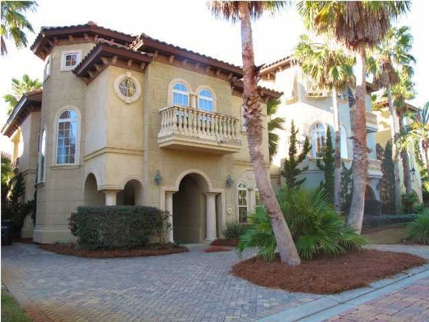 St. Tropez is an exclusive Gated Tuscan styled neighborhood with cobblestone streets, deeded beach access, and great lagoon style pool! This home features faux stained stucco, custom tile roof and trim, gorgeous community pool with tropical palms and exotic vegetation. Private balcony with cypress ceilings & slate floors, off of living area overlook the 80'X60' lagoon style pool with water fountains, Jacuzzi and Bath House. This 4 bedroom, 3.5 bath home features a custom kitchen with granite counters, authentic stone detailing, multi-colored clay tile floors. Downstairs, you will find stained concrete floors, 3 bedrooms and 2 baths. Upstairs is the living area, kitchen and 2nd master with gorgeous master bath and half bath. Located on scenic Hwy 98 just steps from the beach and