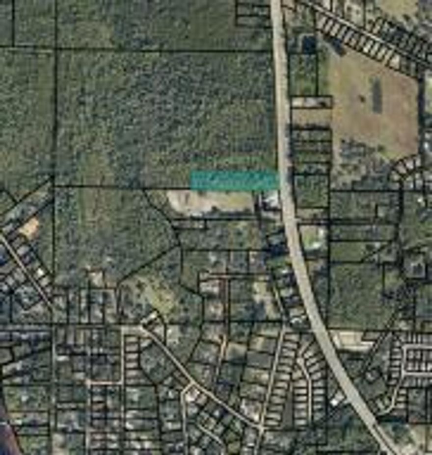 3.03 Acres Commercial Land in a area that is seeing a lot of new development, located on Hwy 87 in Holly/Navarre , great investment property or development property, heavy traffic count going to Navarre Beach , excellent location for many uses. the seller believes property can be rezoned commercial after his conversation with the county.