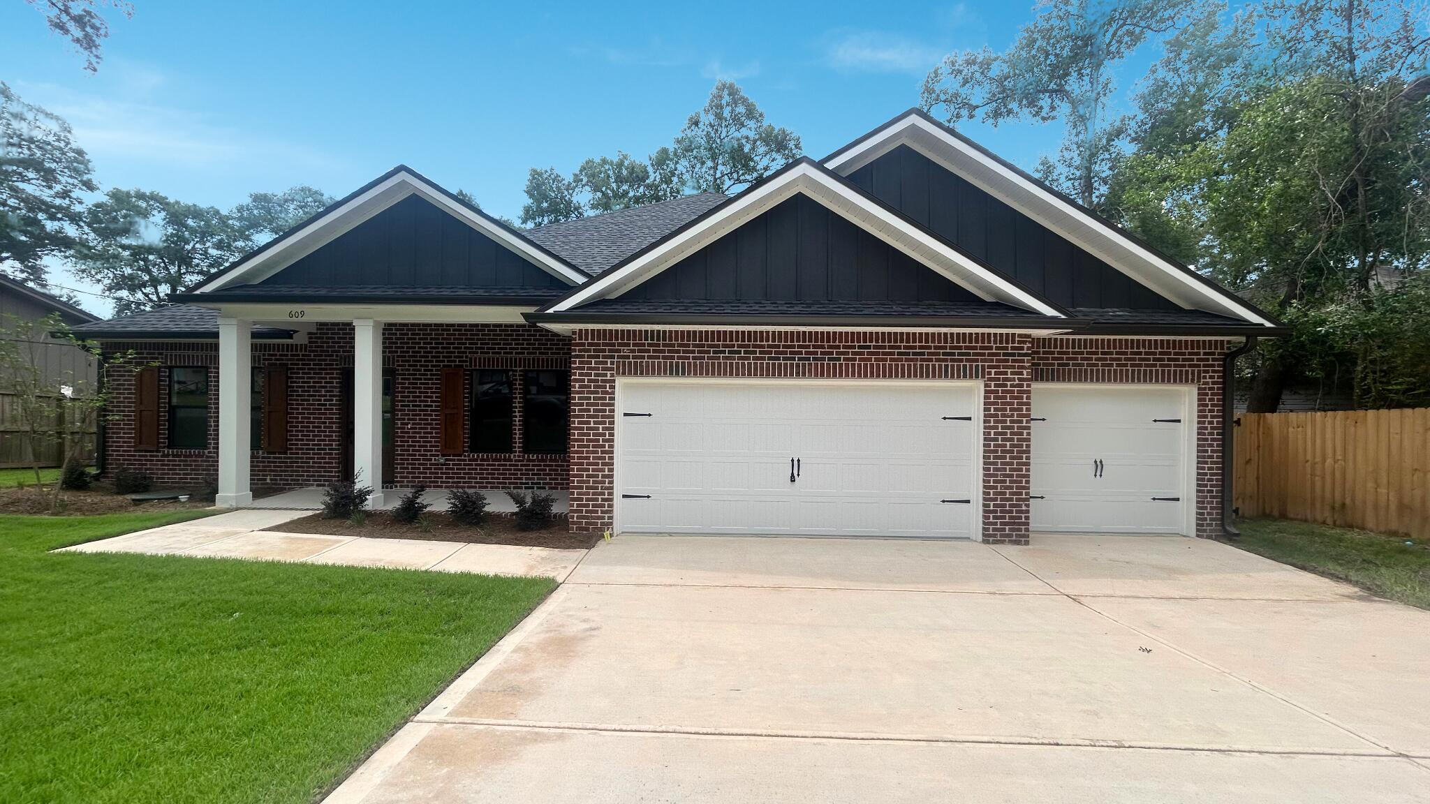 This brand-new home currently under construction combines modern design with everyday functionality, featuring 5 bedrooms, 3 full baths, and a spacious 3-car garage. The open, split-bedroom layout provides both privacy and a seamless flow, making it ideal for family living and entertaining. The kitchen is a true centerpiece with quartz counters, a gas range, soft-close cabinetry, a farmhouse sink, tile backsplash, and a walk-in pantry. Luxury vinyl plank flooring runs through the main living areas, adding both durability and style. Outside, the fenced backyard offers room to play, relax, or host gatherings with ease. With thoughtful upgrades already included (fence, refrigerator, and blinds), you can settle in without the extra expense.Centrally located in Niceville, you'll be close to top schools, shopping, dining, and recreation, with the Gulf's white-sand beaches only a short drive away. Photos are of the same floor plan built by the same builder in a different location. Some colors and finishes may not be exactly the same.