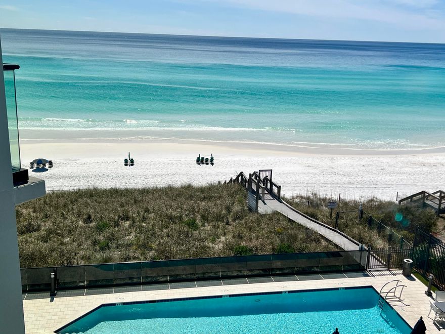 Uninterrupted gulf views take center stage at this exceptional penthouse in Costa Blanca, an exclusive enclave of only 14 luxury residences along Scenic Highway 30A. Perched on the fourth floor with coveted southwestern orientation, this penthouse captures the majesty of emerald waters and dazzling sunsets from every vantage point. Walls of glass and soaring ceilings invite the horizon indoors, while an expansive private balcony provides a front-row seat to sugar-white sands and rolling surf.Encompassing more than 2,800 square feet, the four-bedroom, four-bath residence feels both spacious and refined, with finishes that reflect timeless coastal elegance. Driftwood inspired tile flooring flows throughout, grounding light-filled interiors that include a chef's kitchen appointed with Wolf and Sub-Zero appliances, quartz countertops, and custom cabinetry. Designed for effortless gathering, the open floor plan seamlessly connects kitchen, dining, and living spaces, offering the comfort of a private home without the upkeep of beachfront property.

Penthouse 400 is complemented by two premier assigned garage parking spaces  ideally positioned nearest the elevator for convenient access  as well as a private storage unit. Costa Blanca's resort-style amenities extend the experience, with a gulf-front pool and spa, fitness studio, and more than 200 feet of pristine beach frontage complete with chair and umbrella service. Just across 30A, Gulf Place brings dining, shopping, and entertainment within easy reach, making this location as vibrant as it is serene. With exclusivity, elegance, and breathtaking gulf panoramas, this residence embodies the finest expression of 30A living.