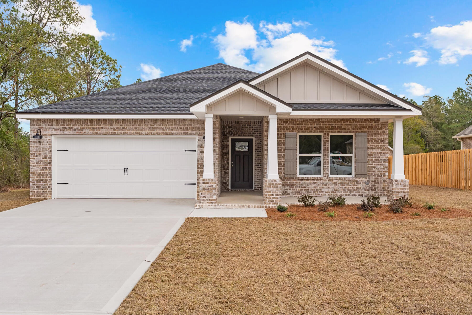 MAYBELLE ON MT OLIVE - READY OCTOBER - SELLER WILL CONTRIBUTE UP TO $10,000 TOWARDS CLOSING (restrictions apply). All brick home, no HOA, low county taxes, and ONE FULL ACRE. Room to roam + relax on front or rear porches! Functional open plan has split bedrooms, primary bath w/double vanities, linen storage, walk-in closet and shower only. Family/dining nook and kitchen have raised ceilings, recessed lighting, work island with bar seating, white shaker cabinets, corner pantry. Quartz countertops in both bathrooms/kitchen, carpet in bedrooms, ceiling fans thru-out. Finished garage has pull down stairs for some attic storage. Photos of similar completed home, elevation, interior/exterior colors will vary.