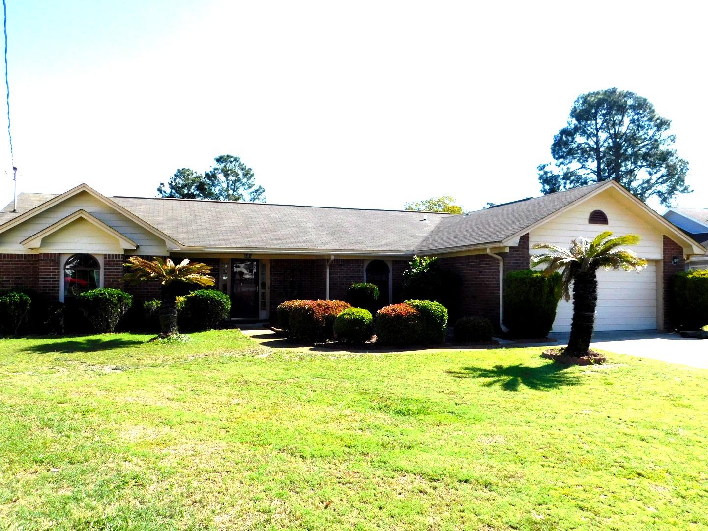 Wonderful move-in ready brick home on huge private lot with water frontage on Orion Lake and only 8 miles from Hurlburt Field! Plenty of backyard space for a pool or just to relax and fish in the stocked lake with your own private water frontage! The fenced back yard has a storage shed, sprinkler system and double gate for easy access to storage. Entering this home on a quiet cul-de-sac, you will appreciate the open flow of the great room featuring a vaulted ceiling and cozy wood burning fireplace opening through French doors into the Florida room. The Florida room leads to a wonderful 30x12 screened porch with CTI decorative finish on the floor for a clean and safe fun space! The open and airy, theme continues from the living room to dining room to kitchen.