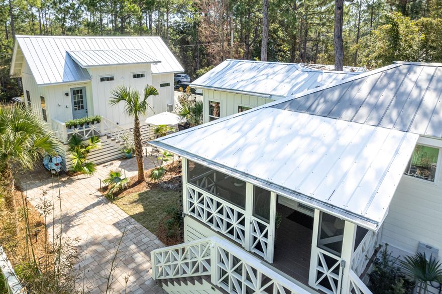 Experience the charm of Old Florida along 30A's Emerald Coast! This beautifully remodeled property at 90 Chelsey Lane offers a 2-bedroom, 2-bath main house featuring a meticulously updated kitchen with high-end Z-Line natural gas appliances. The outdoor space is equally impressive, boasting a large covered outdoor kitchen area, lush landscaping, and elegant pavers throughout. Additionally, a newly constructed 1-bedroom carriage home adds extra versatility and value.With over $70K in rental revenue from the main house alone in 2024, this property is a fantastic investment opportunity or personal retreat. Don't miss out on this stunning coastal gem! Recently Appraised for $1.3M