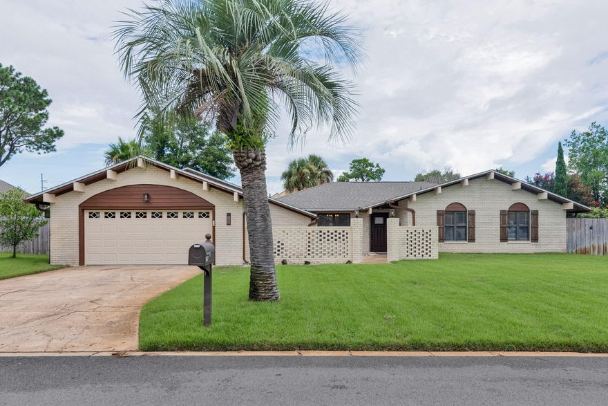 Gorgeous 3 bedroom, 2.5 bathroom POOL home with an office and a sun room in the highly sought-after community of Villa Venyce in Gulf Breeze! Charming courtyard in the front of the house leads you to the front door. Tiled flooring throughout. Featuring a large, open living room with a wood-burning fireplace, eat-in kitchen with granite countertops, laundry room with built-in cabinets, oversized 2 car garage, formal dining area, office space with french doors, and a large bright sunroom with a door that leads you to the backyard Oasis. Privacy fenced backyard with a sparkling pool surrounded by a large concrete deck to the patio area. LAWN AND POOL SERVICE INCLUDED. Excellent location - zoned for Gulf Breeze schools, just 5 miles to Pensacola Beach,  and just minutes to shopping, dining, and local points of interest!