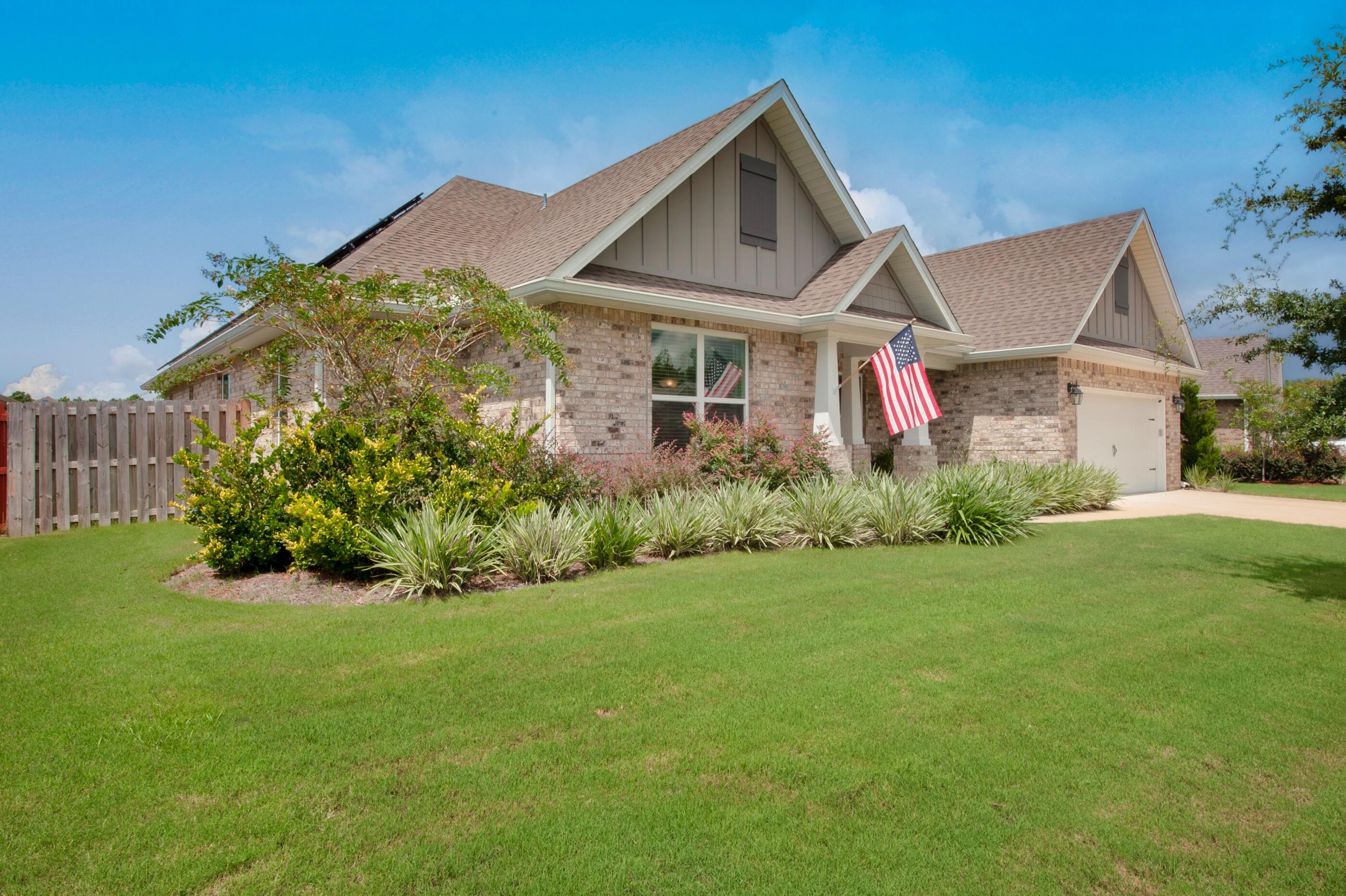 Welcome home to Hammock Bay in the pristine Sweetwater neighborhood! This newly built 2020 still looks and feels brand new! This home has been meticulously maintained with the perfect aesthetic updates throughout. As you walk into your new home, you'll fall in love the with large cover front porch and the beautiful landscaping surrounding it. This large home has luxury laminate flooring throughout which matches perfectly with the newly painted and textured walls. Immediately to the left you'll find a large office and formal dining room to the right. Continue walking in and the home opens into your large living room and kitchen. The elevated ceilings and large windows makes this area really shine with natural light. Openness is truly an understatement in this home. The kitchen features stainless steel appliances, granite countertops, a large island, large pantry, and even a separate coffee area just down the hall to the formal dining room! The kitchen also has an extended eat-in kitchen with large windows to match the living room. To the left of the house, you'll find your master bedroom with tray ceilings. The master bathroom is recently updated with a new rainfall shower, separate soaking tub, a large walk-in closet, and new custom title throughout. The rest of the home features sizable bedrooms with large closets. This home also comes with a Q.Peak Dou-G6 solar panel system producing 9045 kWh annually. In addition, Hammoch Bay's amenities include General Store, 3 community pools, fitness center, playground, tennis, pickleball and miles of walking trails. Schedule a showing today!