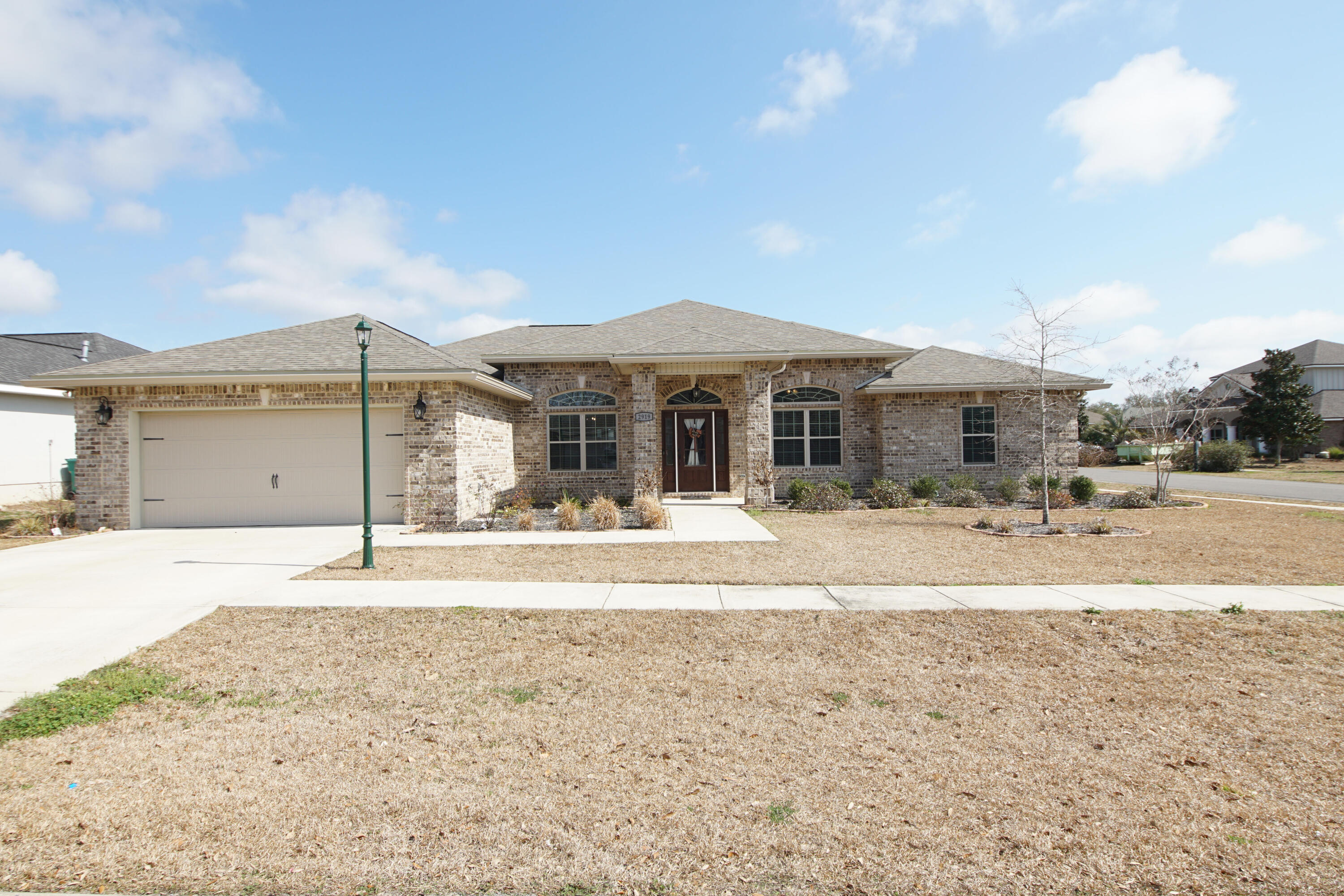 Welcome home to this stunning home in South Crestview. Conveniently located to Duke , Eglin and the beaches make this home the perfect place for your family. The home was built in 2020, the owners have added some special featured millwork throughout the 4 bedroom 3 bath home that have added to the charm of this house in the gated community of Chanan Estates. The large open kitchen with a breakfast bar & granite counter tops opens to an eat in kitchen area and a large family room that both overlook the patio and backyard. The family room has built in floating shelves and cabinets for extra storage on both sides of the gas fireplace with french doors that open to the covered patio area. Crown molding has been placed throughout the main areas; kitchen, family room ,dining room and office. The floor plan features a split plan with the 4 bedrooms. The master bedroom is located on one side of the house with French doors that open to the patio and a large ensuite bathroom. The bathroom features a separate shower, garden soaking tub, double vanities and a large walk in closet. The owners have add more millwork in here to make this retreat one you will not want to leave. Two bedrooms with a shared bathroom are located on the front side of the home with a guest retreat private bedroom and separate bathroom on the back side of the home. The office/ man cave was created with your main man in mind. With the beautiful custom planked ceiling to the details of the millwork , this is one room that you must see. The back yard has been fenced in with the approved fencing. The large corner lot still gives you plenty of room for family activities.
Make this a must see on your list of homes today!