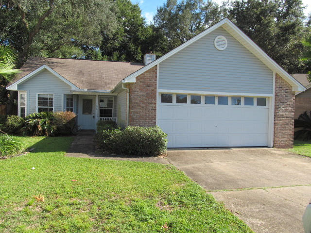 Charming three bedroom and two bathroom home tucked away in Indigo Village. This home offers a great split bedroom floor plan with both a living room and a large family room. The living room features a vaulted ceiling and beautiful fire place. There is also a Florida room. The lot is one of the largest in this neighborhood, with just over a quarter of an acre. This neighborhood is located very conveniently to Bluewater Bay Elementary, Mid-Bay Bridge and Eglin Air Force Base. This home is very easy to view so make your appointment today and don't miss out on this wonderful opportunity to live in Bluewater Bay! Home is sold ''AS IS''