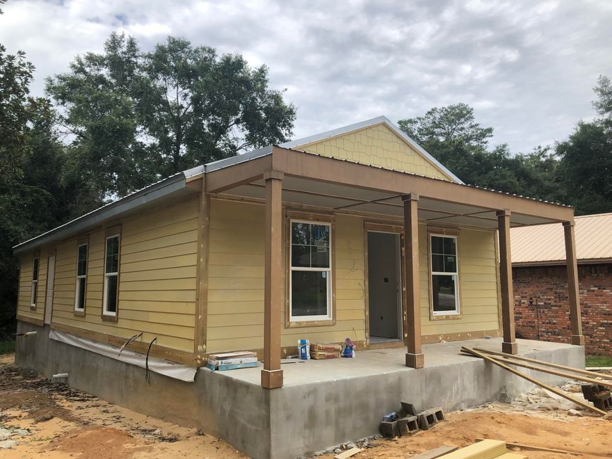 New Home in Niceville under $300k.  That is correct.  This new construction home located in the heart of our great community is waiting on new buyers.  Estimated completion September 1, 2021 for this three bedroom/2 bath home.  This home has an open floor plan with tile baths, stainless appiances, and upgraded counter tops.Front porch offers a great place to sit and enjoy your home after a long day.  Appliances are stainless steel and this home has a tankless water heater as well.This home won't last long, give me a call for your own private showing.