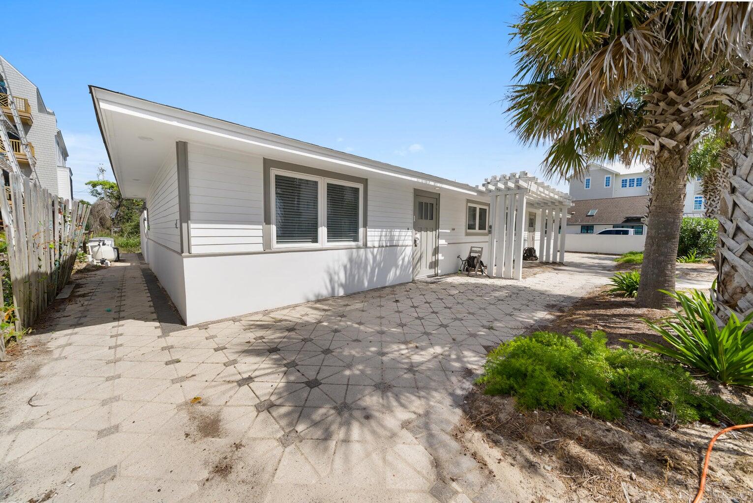 Step into timeless coastal charm with this classic Old Florida-style one-story home, perfectly situated on a corner lot just steps from the beach and close proximity to abundant amenities. This 4-bedroom, 2-bathroom gem offers beach views with vintage character and modern comfort.Enjoy lazy afternoons in your private pool, soak in the sunshine on the beach or entertain in the one of the two full kitchens. The layout offers ideal privacy with a double master bedroom design with views of the pool.Whether you're looking for a forever home or a laid-back vacation getaway, this coastal retreat delivers the perfect mix of charm, comfort, and great location. Call today!