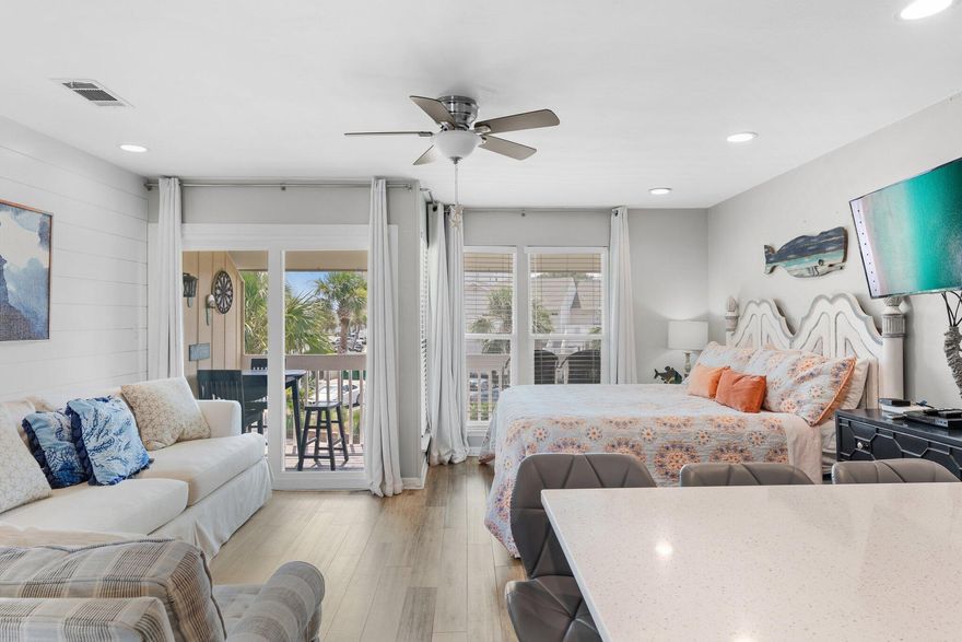 Vacation retreat with over $7k in earned bookings YTD PLUS another $14,000 in future bookings makes this the perfect investment! Act quickly if you're interested in this charming, updated studio condo. It is beautifully decorated which is why it generates great rental income. Located next to the pool and just a 2-minute walk to the beach, this condo features stainless steel appliances, energy-efficient windows, hurricane-rated sliding doors, and a renovated bathroom with a walk-in shower. Additional upgrades include shiplap accents, a new HVAC system, and quartz countertops. The property, SPC, is a resort-style facility occupying 43 acres in the heart of downtown Destin. Notable on-site amenities include 1,100 feet of deeded beachfront access, five pools, six tennis courts, pickleball, bocce ball, shuffleboard, canal boat docking, marina slips (by reservation and subject to availability), and a popular nine-hole par-3 pitch-and-putt golf course. Make your appointment today for a private showing! 