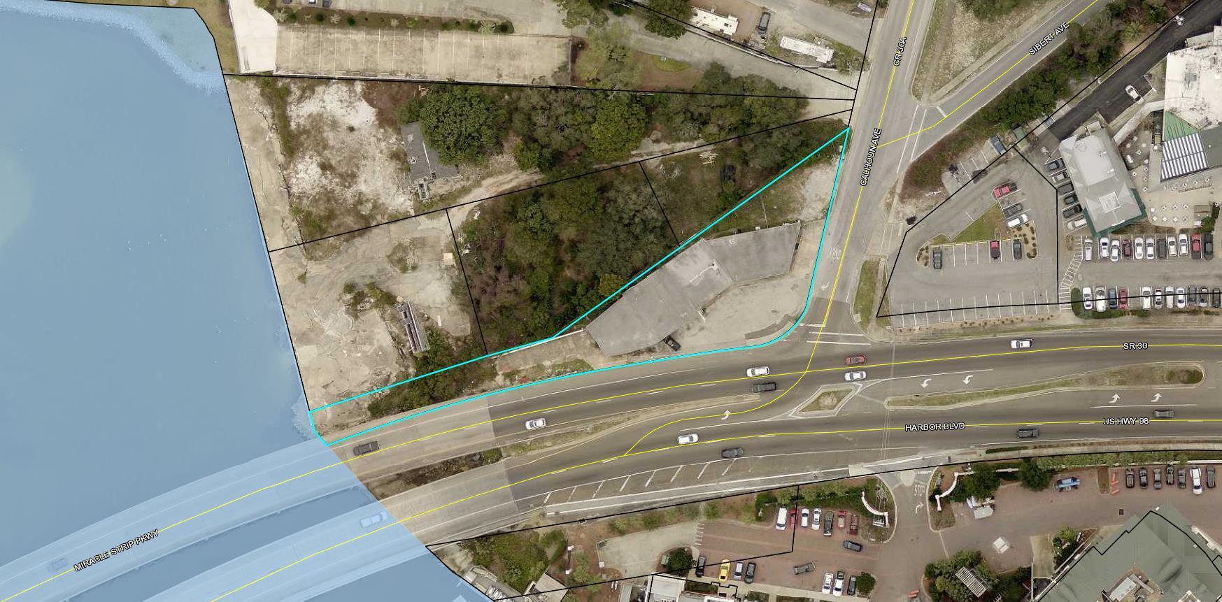 PRIME LOCATION FOR WATERFRONT REDEVELOPMENT   IN DESTIN!  Commercial acreage at the corner of Harbor Boulevard (US Hwy 98) and Calhoun Ave. This property is located at foot of Destin Bridge on the North side of Hwy 98 as you are heading West toward Ft. Walton. It is directly across the highway from the Emerald Grande. Beautiful views of the East Pass and Crab Island with all the boating and water activities.  Approximately 250 feet of waterfont. Zoned South Harbor Mixed Use (SHMU). Potential hotel, restaurant, and marina development. The property has a month to month tenant and a billboard producing income. Buyer to confirm all zoning requirements, lot dimensions, and pertinent information.  Property consists of 5-parcel identification numbers for 2.12 acres.