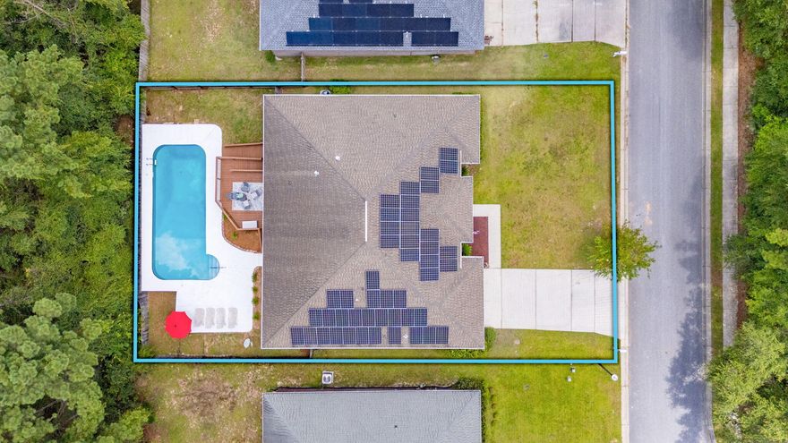 Looking for space, value, & an easy drive to 7SFG or Eglin AFB? This South Crestview home checks every box & sits in one of the most desirable neighborhoods in town, Fox Valley.With a 2025 roof & paid off solar panels, the value of this home is undeniable (electric bill=$30/month!  Other major items have already been updated: HVAC/appliances 2021, pool liner 2020, water heater 2023.Inside, the home stretches out with room for everyone: 4 bedrooms, 3 FULL bathrooms, two separate living areas, a formal dining room, and a massive kitchen ideal for cooking/gathering. The star of the show? The pool! If you've been dreaming of Florida living, just bring your floaties, you'll spend every weekend here.Enjoy a 1640 saltwater pool & expanded concrete deck for lounging.*Private to the rear*