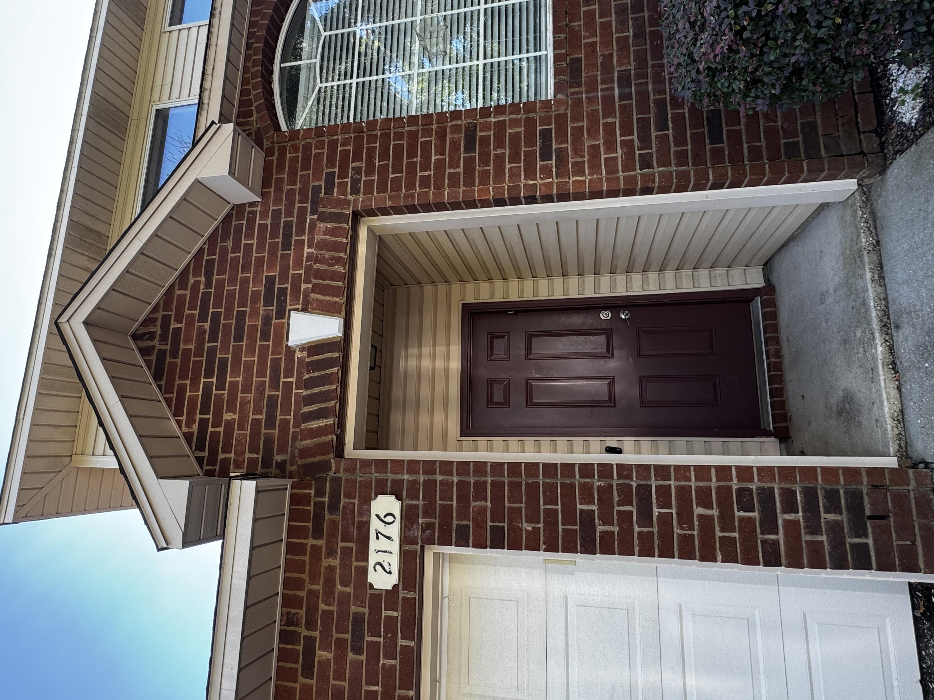 Welcome to this beautifully maintained, contemporary townhome located in the heart of Navarre. Just a short, 4-mile commute to the sugar-white sands of Navarre Beach, this 2-story gem offers the perfect blend of style, convenience, and low-maintenance living. Inside, you'll find a modern kitchen featuring stunning granite countertops, stainless steel appliances, and an open layout ideal for entertaining. The main living areas boast durable, easy-to-clean flooring, while cozy carpet is reserved for the bedrooms and staircase for added comfort. The primary suite is conveniently located on the main floor, providing added privacy and separation from the additional bedrooms upstairs -- ideal for families, guests, or home office needs. Enjoy the ease of direct-entry from your attached 1-car garage, and let the HOA handle all lawn care so you can focus on enjoying life along the Gulf Coast. Whether you're looking for a full-time residence, vacation getaway, or investment opportunity, this stylish townhome is move-in ready and sure to impress!