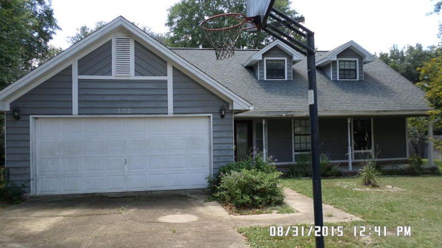 This is an REO property and this one will not last! Located in the popular Page Place subdivision off of Live Oak Church Rd, this 1749 square foot 2 story home has 4 bedrooms 2 and a half bedrooms and large fireplace. Property has all wood exterior and 2 car garage. Resting on a large .41 acre lot, this home needs some work but is priced to move. All bedrooms and baths are located on the first floor with a large loft on the second floor. If you were waiting for that home that has ''that'' potential, call today and set up your showing today.