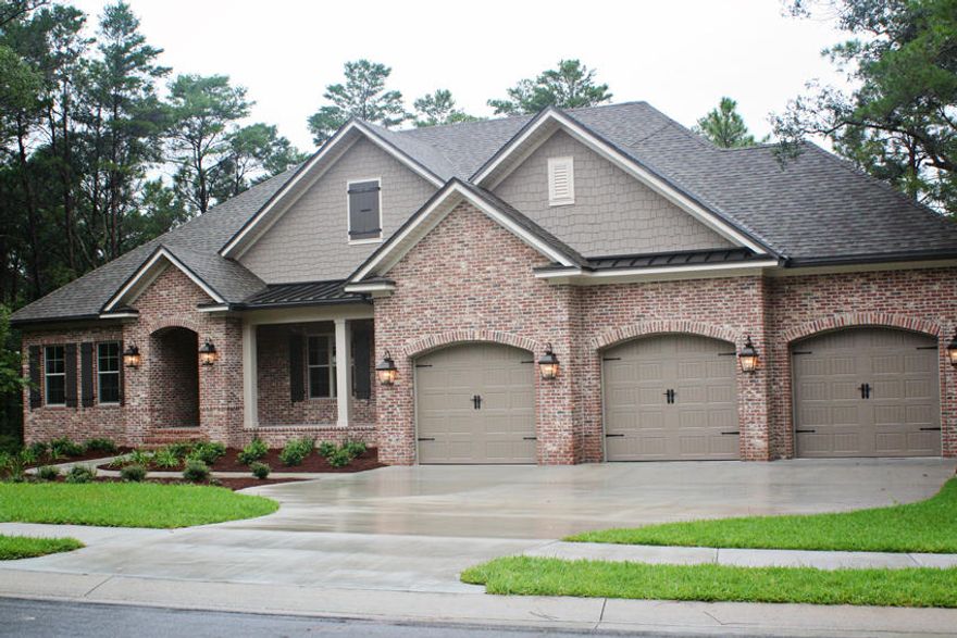 A beautiful new construction 'Treetops Series' home is ready to be built in Swift Creek Plantation. This home has over 5000 sq ft of heated and cooled space; Aprox 4500 complete and impeccably detailed with the remaining space heated and cooled. It all starts with a stunning brick and hardy exterior, a large three car garage, circular driveway and an oversized lot with woods behind and to one side. As you enter, you will experience the quality this builder is known for; 10' ceilings in the main floor common areas with 8' doors, 5'' crown molding and encased windows and entries throughout the home. Design details include hand scraped wood flooring, 20'' porcelain laid diagonally, custom built Woodharbor Shaker cabinets w granite tops, Frigidaire Professional appliances, and much more.