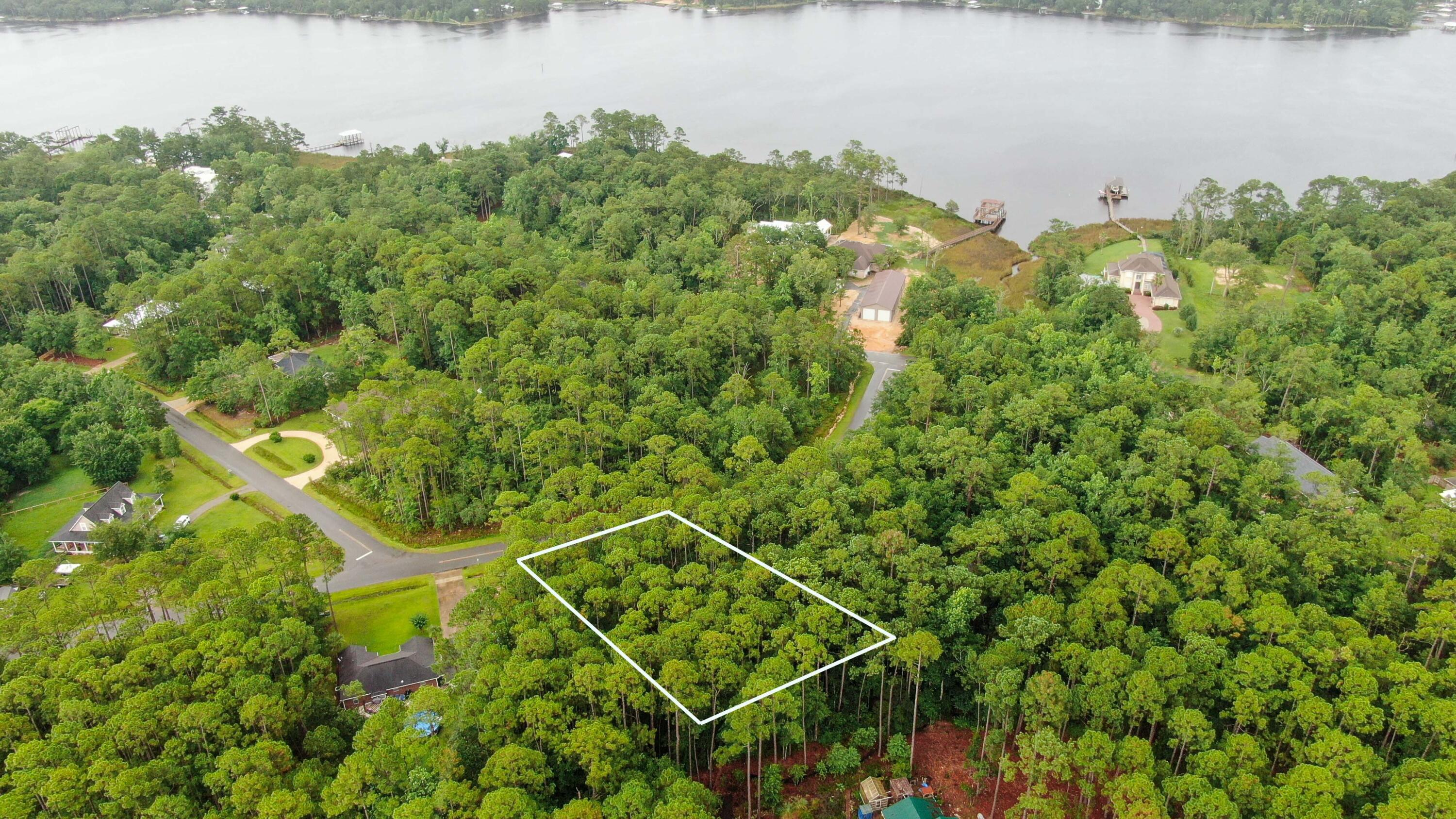 Come check out this BEAUTIFUL 0.51 ACRE lot in the charming community of Lagrange Shores in the growing city of Freeport, FL. Come build your dream home on this wooded parcel. The best part is there is no active HOA, No Homeowners Association dues. It is very close to Lagrange Bayou and the Choctawhatchee Bay. With the Marina Village Boat Launch or 4 Mile Creek public boat launch close by; there is no need to miss another sunset on the water. Not to mention you are not far from some of the World's Most Beautiful Beaches and all the action of shopping, dining, and entertainment that Southern Walton County provides. Don't let this lot get away.