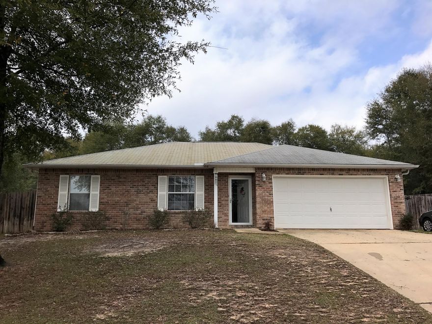 Love, Love, Love. Every inch of this well appointed home was made for you. High vaulted ceilings. Bright open kitchen with lots of cupboards. Screened in Florida room to enjoy the cool evenings under the ceiling fan. Fully fenced back yard. Double garage with auto opener. Storage shed. Big big back yard. Beautiful popular wood looking real tiles.