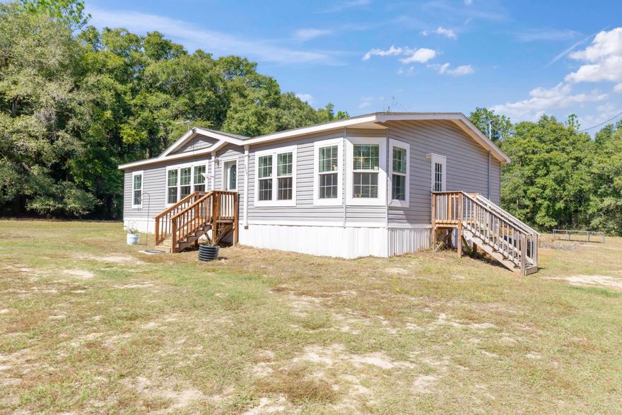 This Country Charmer is ready for you to call it home! It offers both convenience and privacy in the sought-after Baker community. The home features lots of natural light, split bedroom, and open kitchen and living area. You're sure to love the spacious primary bedroom and garden tub in the primary bath. The yard outside is a clean slate for you to plant a garden, build a fire pit, and to make it your own little country escape. Call today to view this gem. Buyer to verify all information deemed important.