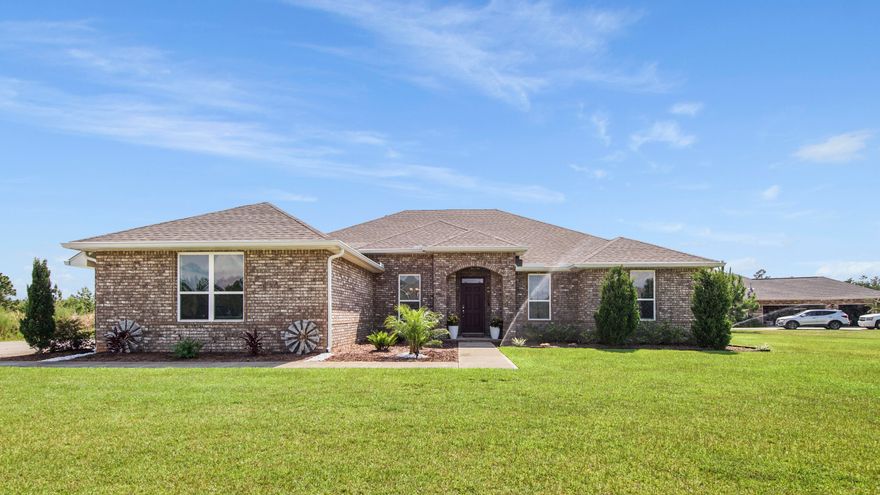 Introducing a luxurious 4-bed, 3-bath home in Freeport, FL. Boasting 2512 sq ft of living space on a .67-acre lot, this residence offers elegance and comfort. Features include glass French doors, quartz countertops, an extended patio, and a fenced backyard. Practical amenities like gutters, attic stairs, and a 220 amp plug in the garage with its own breaker enhance functionality. Nestled in a sought-after golf course community, residents can enjoy common outdoor spaces and the pet-friendly environment. This home effortlessly combines comfort and convenience with air conditioning and a garage. Don't miss the chance to make this exceptional property your own.