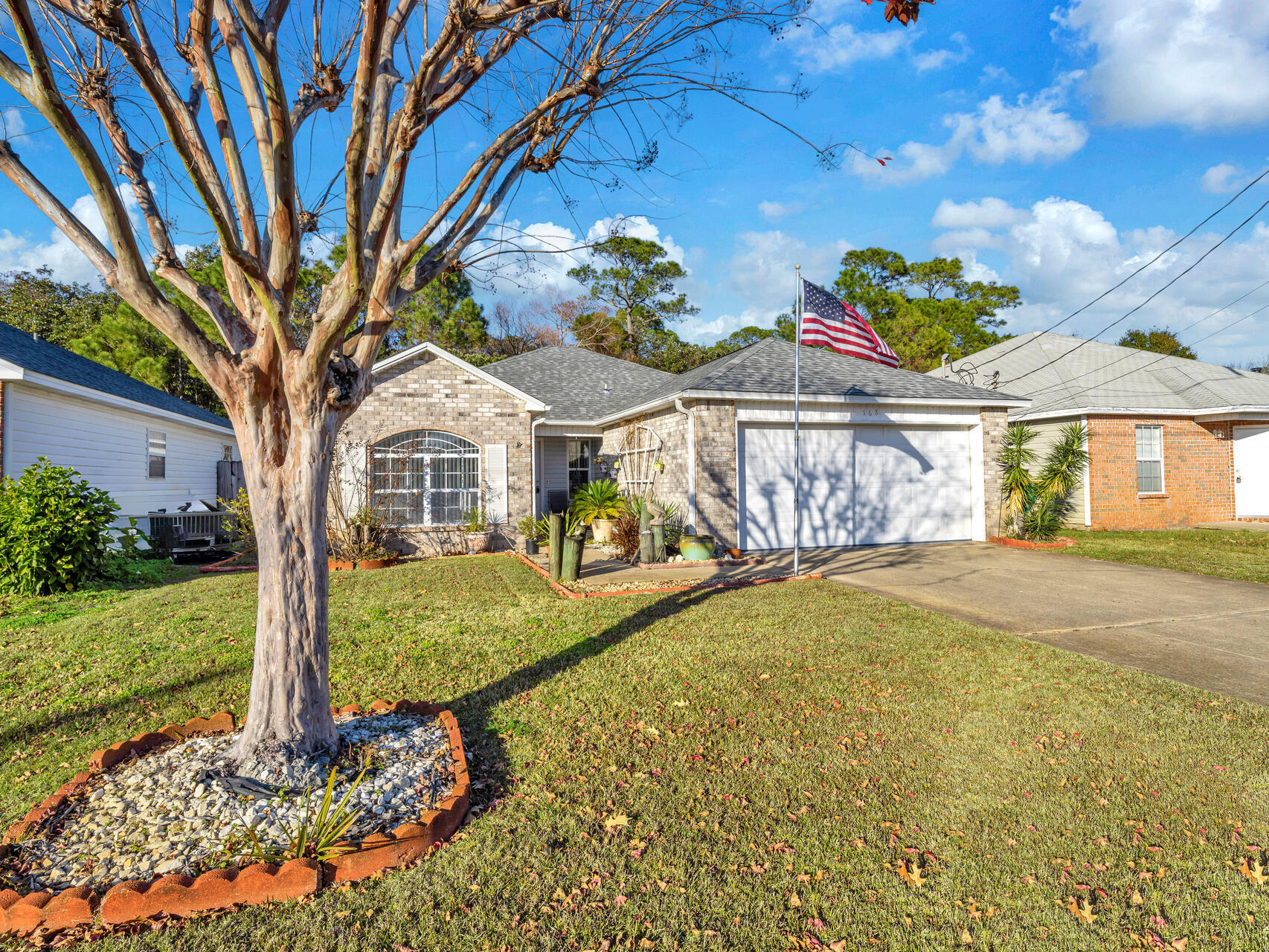 WONDERFUL, RENOVATED HOME IN GREAT NEIGHBORHOOD W/BEAUTIFUL, PRIVATE BACKYARD! The newly renovated kitchen w/quartz counters, breakfast bar, white subway tile backsplash & floating shelves flows effortlessly into the dining area & large Great rm. Freshly panted interior & high tray ceiling provide a fresh, updated look. Located away from the other BRs, unwind in your large, private master retreat & master bath w/new quartz counter, mirrors & big walk-in-closet.  Other features include laminate & tile floors, 5 Yr Roof, 6 Yr HVAC, NEW carpet in both BRs & NEW fans & fixtures.  Enjoy your morning joe or sunset libation on your covered porch while savoring your meticulous, private backyard w/Zoysia grass & Loquat tree.  Located in Mary Esther, schools, shopping & both bases are near by.