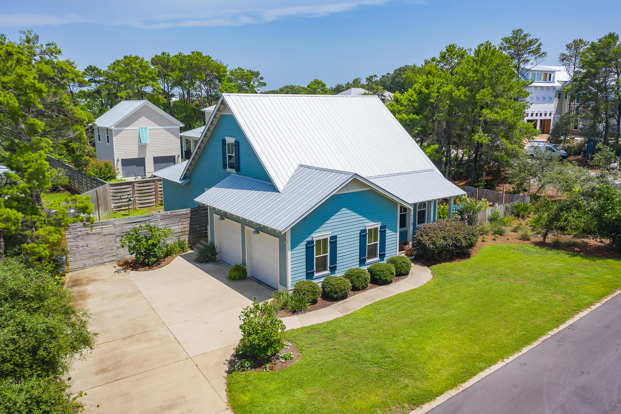 Located in Old Seagrove just two blocks from the gulf on a large corner lot and less than 1/2 mile to Seaside. The open floor plan features antique oak floors throughout and is anchored by a floor-to-ceiling brick fireplace. Two sets of french doors open on to the screened in porch allowing for indoor/outdoor living. The well appointed kitchen features hand-hewn shelving, farmhouse sink, glass cabinets, stainless appliances & quartz countertops. The master bedroom on the main floor offers the convenience of one floor living. A guest bedroom & full bath are on the main floor. An additional guest bedroom and a large bonus room along with full bathroom are located on 2nd floor. Plenty of room to add a pool. Never rented