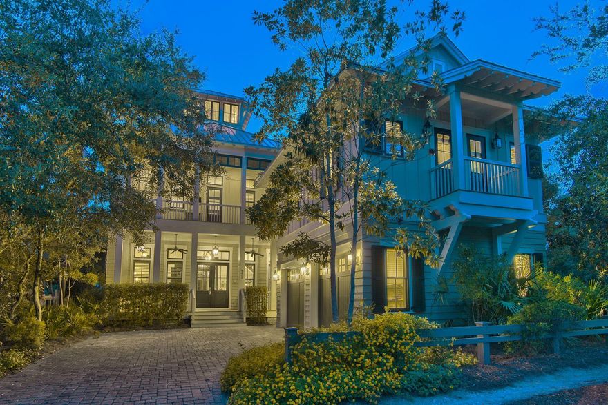 Unparalleled lake front positioning juxtaposed exemplary architectural detail define this private oasis primely located on an oversized corner lot in the heart of Phase III Watercolor. This well maintained beachside retreat is prominently situated on 50' of prime frontage offering a coveted southwest orientation on Western Lake yielding sunset vistas and ample privacy. Notable architectural elements rendered by TS Adams design include an impressive three story vertical footprint crowned by a fourth story panoramic viewing tower allowing 360 degree views over Western Lake and Watercolor.