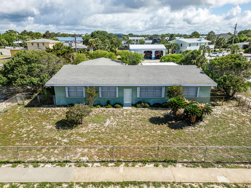 Never-Before-Offered Coastal Gem | Prime Okaloosa Island Location.For the very first time, this one-of-a-kind coastal home is hitting the market--offering a rare opportunity to own directly across the street from the breathtaking Gulf of Mexico. Perfectly positioned on Okaloosa Island, this spacious 5-bedroom, 3.5-bath residence spans 2,392 square feet and is bursting with potential.Solidly built with incredible bones, this home features a desirable split floor plan, offering both functionality and privacy. One of the standout highlights is the separate mother-in-law suite--complete with its own bedroom and full bath--ideal for guests or extended family. Inside, the home invites your vision. While it could benefit from modern updates, the layout and structure provide the perfect canvas to create your dream beachside retreat. Generous living areas, ample natural light, bedrooms with sitting rooms, natural beamed ceilings, and a location that's truly second to none make this a standout investment.

Yards from sugar-white sands and emerald waters, this property combines location, size, and opportunity in one unbeatable package. Don't miss the chance to own a legacy home in one of the most sought-after stretches of the Gulf Coast.

Opportunities like this are once in a lifetimeschedule your showing today!