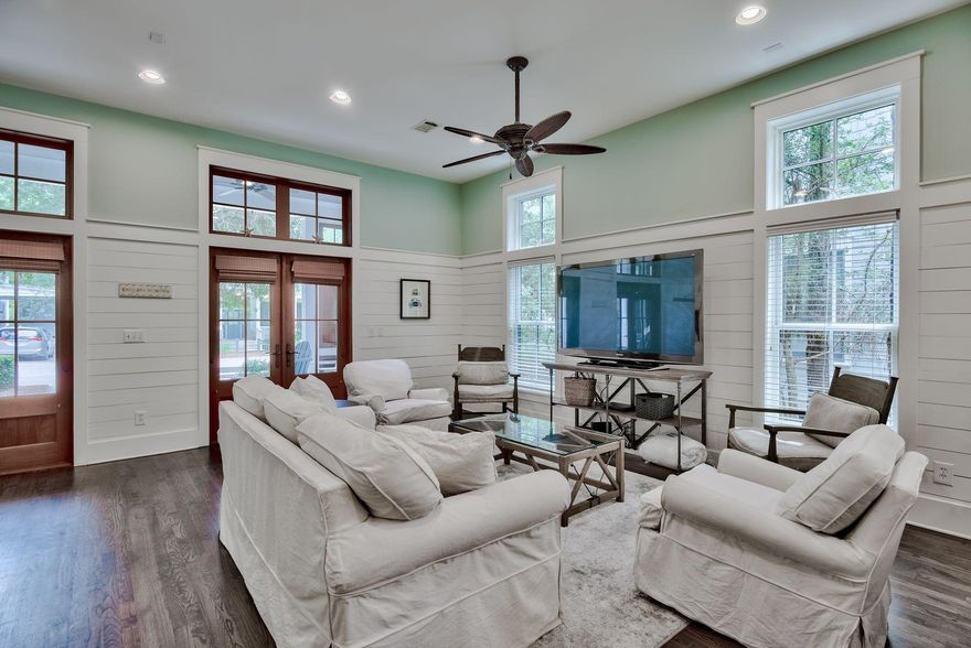 Being sold fully furnished, this four-bedroom plus additional bonus room, four and a half bathroom home with a two-car garage and carriage house is rental ready and in an ideal location in Phase Two of WaterColor. You will be within walking distance to the newly updated Camp WaterColor and a short hop from the Publix shopping center as well as the Beach Club and tennis center. The open living, dining and kitchen are ideal for entertaining or family get-togethers. Shiplap covers the walls in the living room and kitchen. The master bedroom is ideally located on the first floor.  The laundry room with full-size washer and dryer are on the first level as well. Two more guest bedrooms and a bunk room are on the second floor. Hardwood floors run throughout the living areas. The carriage home has a bedroom, bathroom and full kitchen. A screened porch connects the main house to the carriage and is a great place to relax with a drink. There is an open deck on the side of the house and another porch on the front of the home overlooking Western Lake Drive. The total $1260 quarterly WaterColor dues include cable and internet. The dues of $330/quarter to cover the amenity expansion project that was assessed January 1st, 2017, covering the cost for the WaterColor Beach Club and Camp WaterColor Expansion have been fully paid by the seller! There is a 0.5% fee of the purchase price paid by the buyer due at closing to the St. Joe Foundation. There is a $75 transfer fee to the HOA.  Come enjoy WaterColor and all of the amazing amenities it offers: the Gulf front Beach Club with dining, many community pools, tennis courts, fitness, the Boat House, amphitheatre, trails, etc! Also enjoy walking or taking a quick golf cart ride to Publix grocery store and all the surrounding shops and restaurants in WaterColor and Seaside.