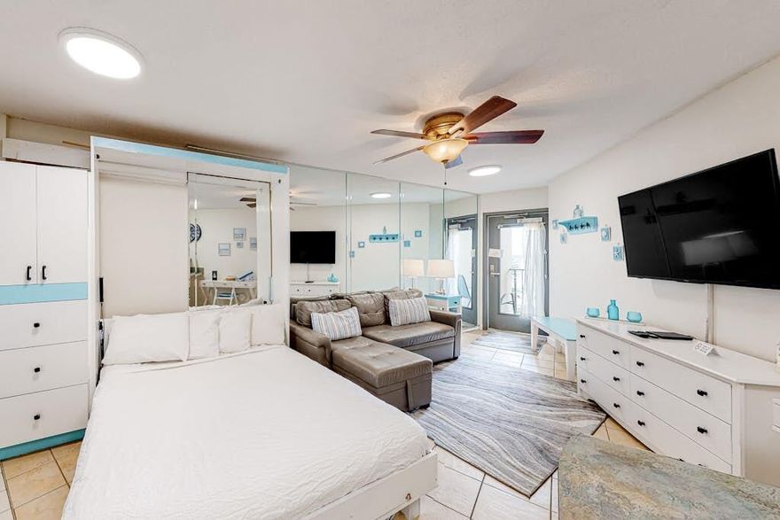 Freshly painted and beautifully refreshed, this third-floor (unit E3) gulf-front studio offers a cozy and functional layout with a small balcony overlooking the sparkling Gulf of Mexico. Designed to comfortably sleep 4 with a Murphy bed and sleeper sofa, the unit includes a full kitchen and bath--ideal for a vacation getaway or income-producing rental.Located at the preferred East end of the beach near the State Park, this studio boasts new furniture, excellent condition, and low HOA fees. Enjoy the convenience of well-maintained property amenities while taking in breathtaking gulf views. A perfect opportunity for a turnkey vacation retreat or rental investment.